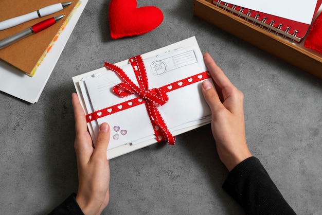 Woman writing a romantic love letter to someone